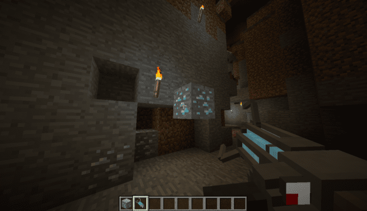 Safely ​holding a block of diamond ore with the Gravity Gun