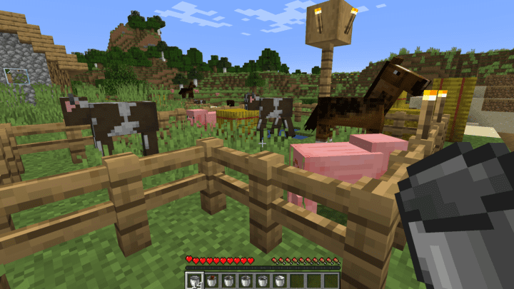 Capturing mobs on a farm with the Get In⁣ The Bucket Mod